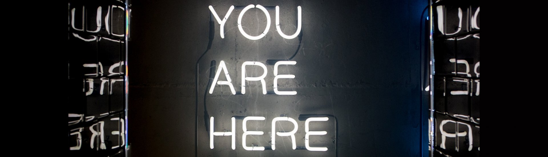 You are here in neonletters.