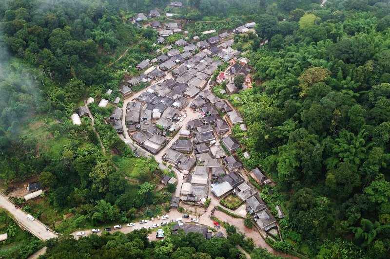 Dorp van het Dai-volk in Nuogang. (Foto: © Xie Jun | https://whc.unesco.org/en/documents/200162)